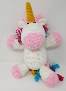 Rainbow Cuddles Stuffed Crochet Unicorn with Bow on Tail Project (huggable view) a chick crafting through Rheumatoid Arthritis cRAfterChick.com